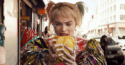 harley-quinn-sandwich-birds-of-prey-holding.gif