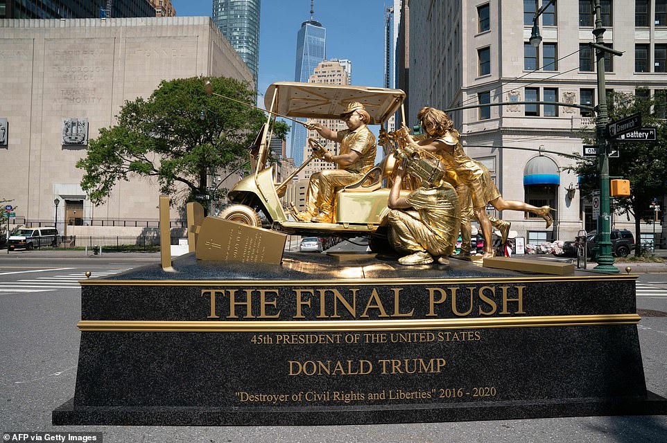 32933954-8711335-A_living_statue_of_Donald_Trump_has_been_unveiled_in_New_York_Ci-a-8_1599601280979.jpg