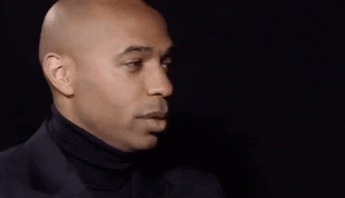 thierry-henry-trying-not-to-laugh-nxkais63bkn6dbca.gif
