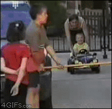 Kid-car-pushed-into-table.gif