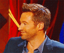 Hugh-Jackman-laugh-to-serious.gif