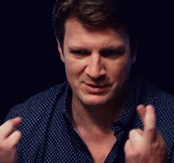 nathan-fillion-fingers-crossed.gif