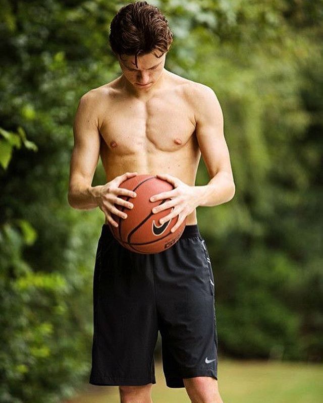 Tom-Holland-shirtless-heads-down-basketball.jpg