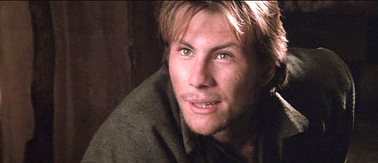 Christian-Slater-as-Arkansas-Dave-Rudabaugh-hoping-someone-knows-his-name-in-Young-Guns-II-1990.jpg
