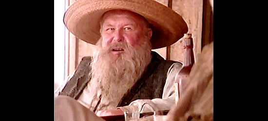 Ned-Beatty-as-Judge-Roy-Bean-explaining-how-he-became-a-judge-in-Streets-of-Laredo-1995.jpg